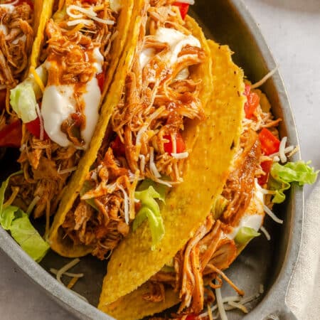 Chicken tacos on a serving platter.