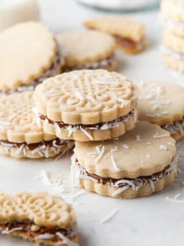 An alfajore stacked on top of two other alfajores.