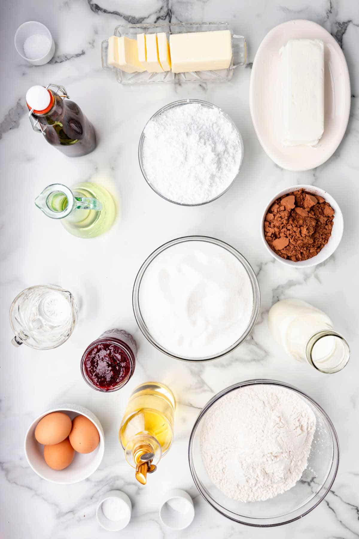 Ingredients for chocolate raspberry cake in dishes. 