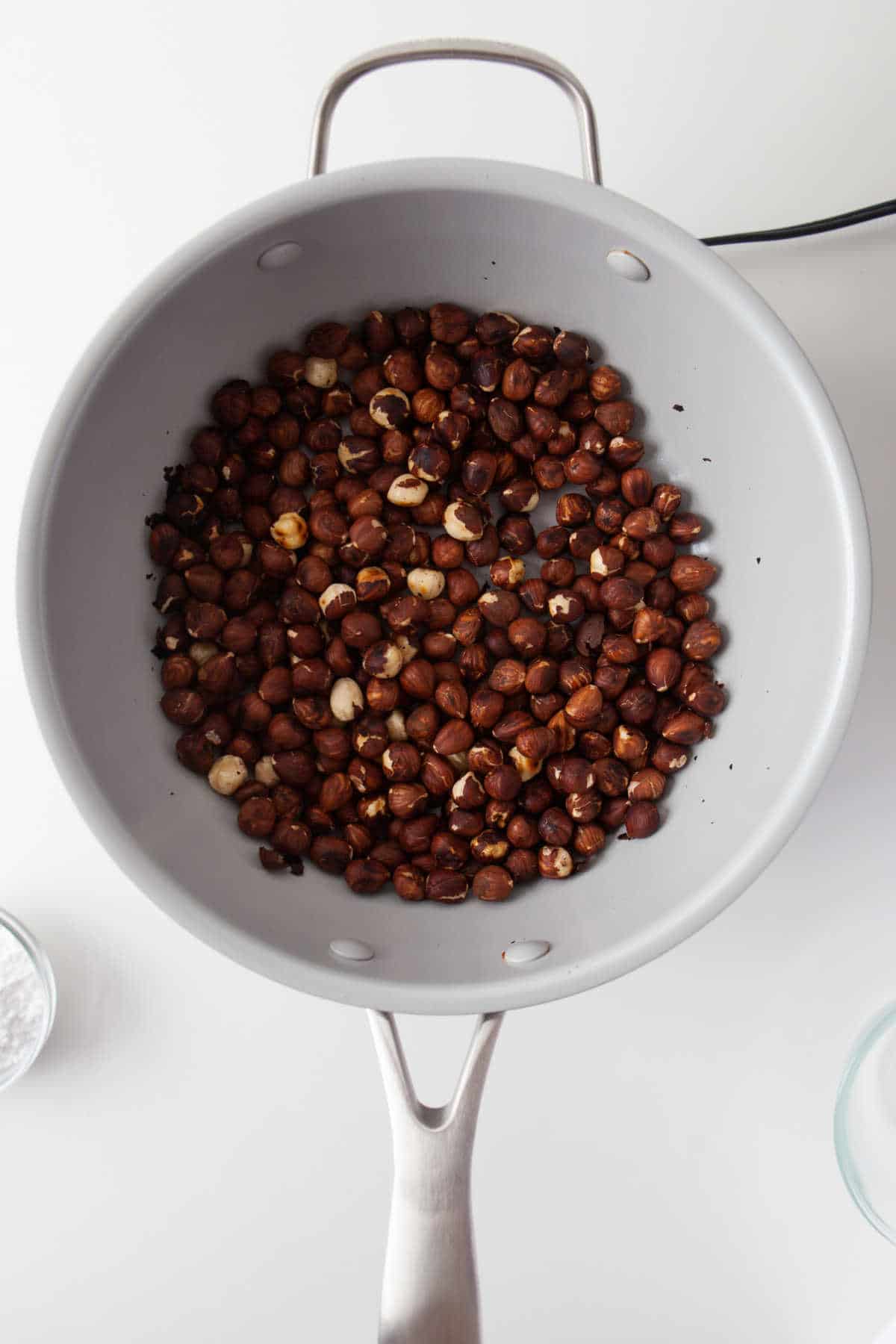 Hazelnuts in a skillet. 