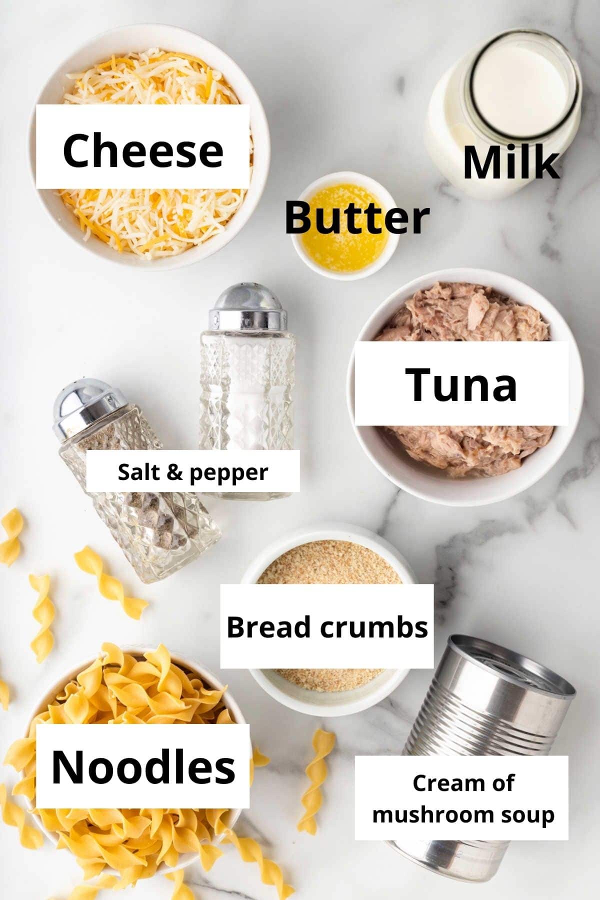 Ingredients for tuna noodle casserole in dishes.