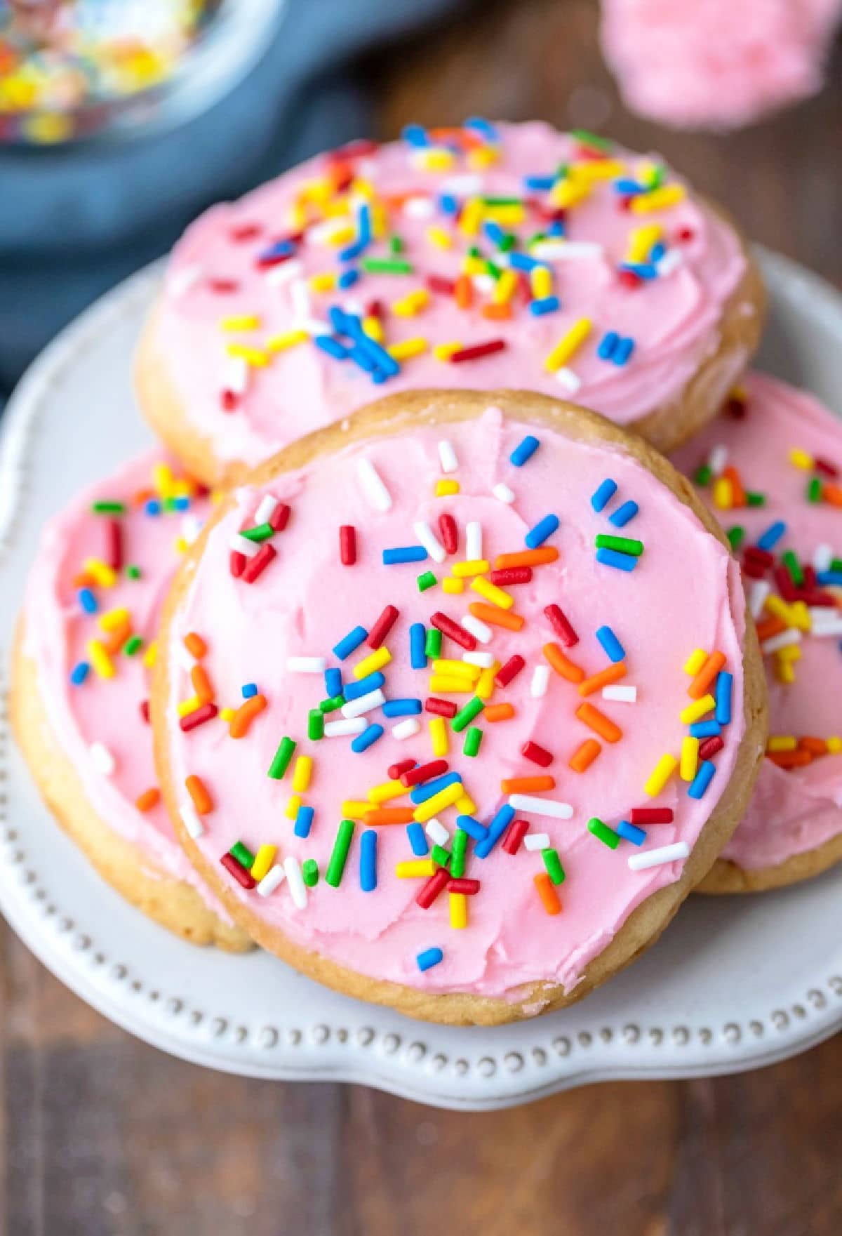 Lofthouse Sugar Cookie Recipe Pink frosted Lofthouse cookie copycats on a cream plate.