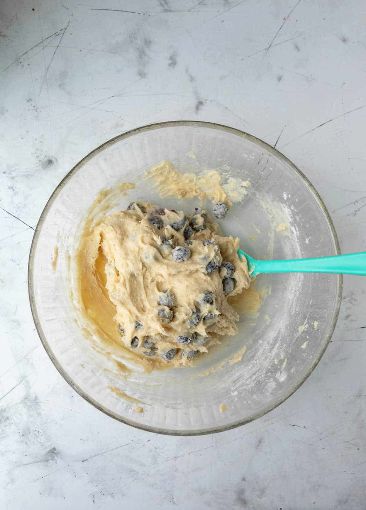 Blueberries folded into batter. 