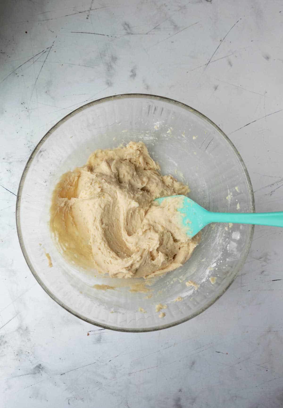 Egg beaten into creamed sugar mixture. 