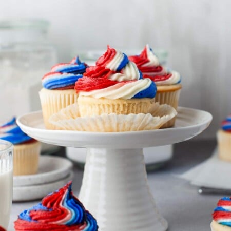 Red White and Blue Cupcakes on a cake stand.