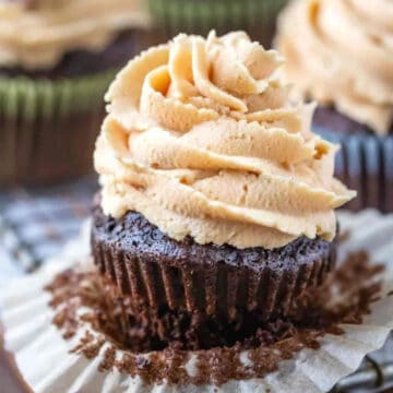 Peanut butter frosting on a chocolate cupcake.