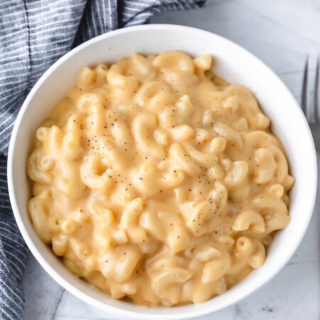 A white bowl full of easy homemade mac and cheese.