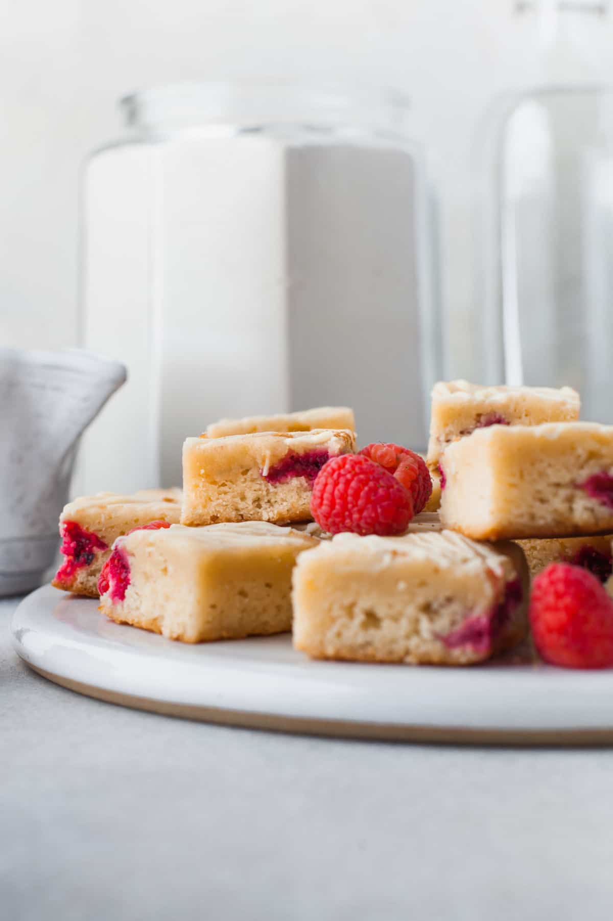 A platter of white chocolate raspberry blondies.