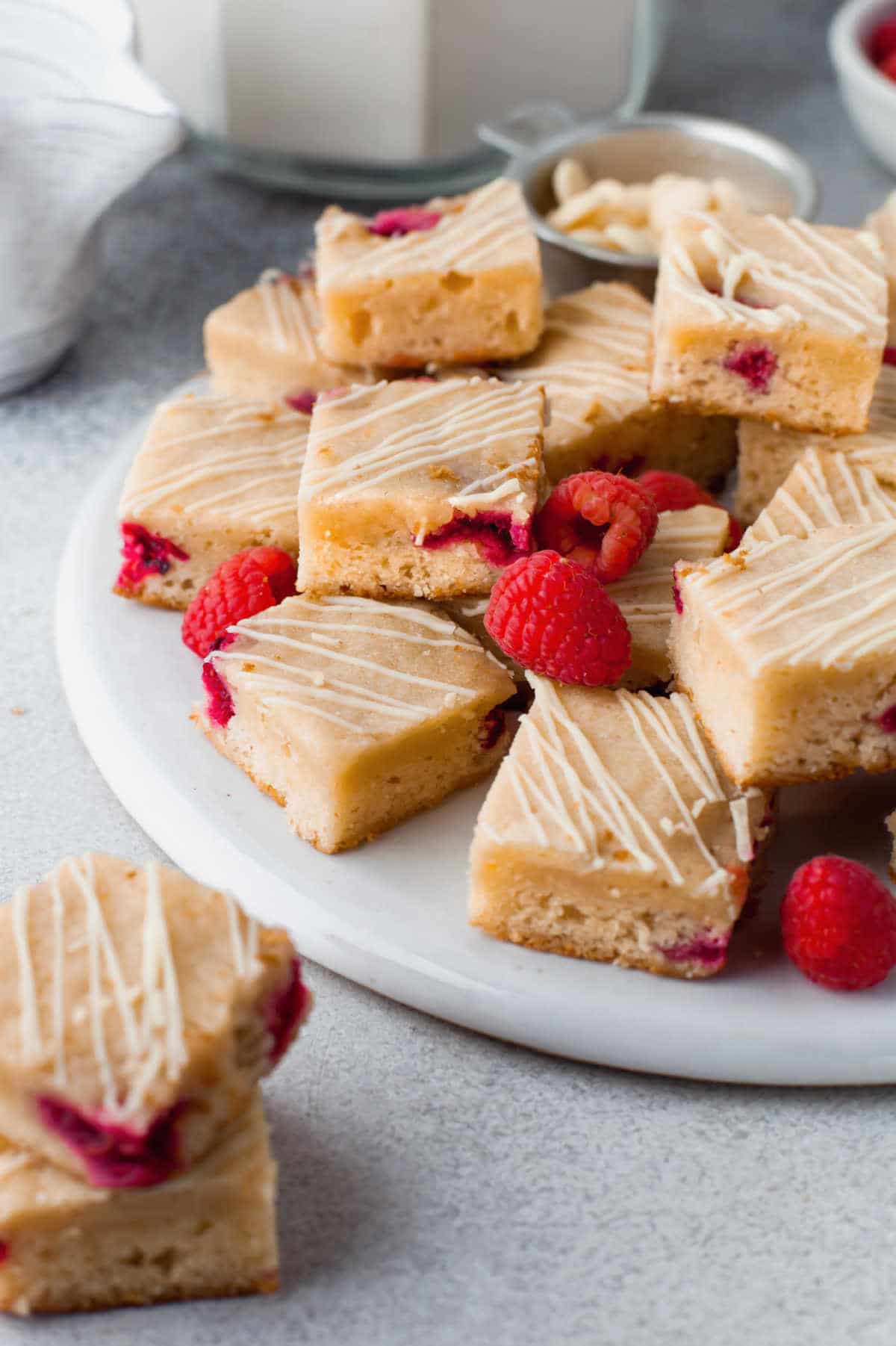 A stack of white chocolate raspberry blondies.
