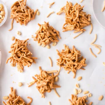 Haystack cookies on a piece of white parchment paper.