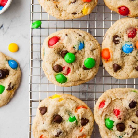 Easy M&M cookies on a wire cooling rack.