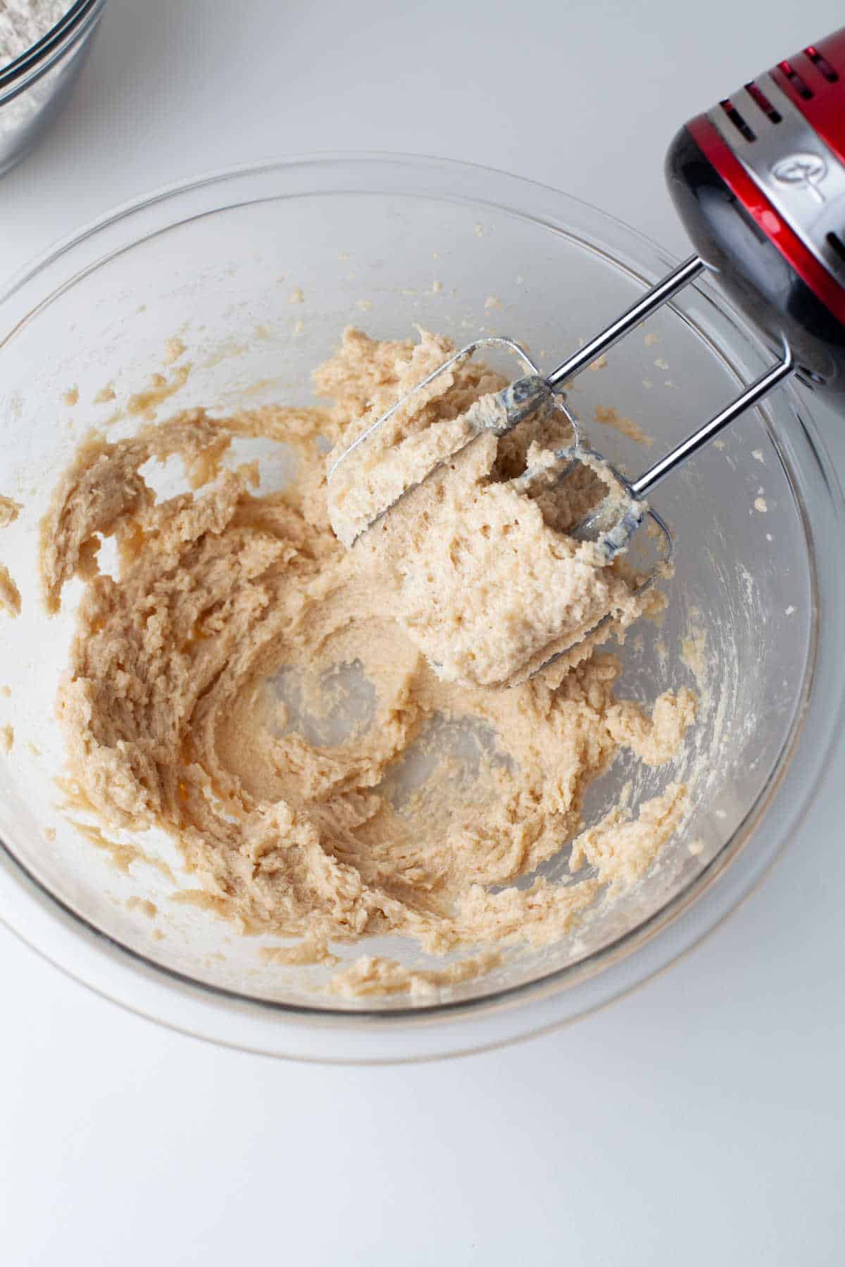 egg and vanilla beaten into creamed butter and sugar mixture.