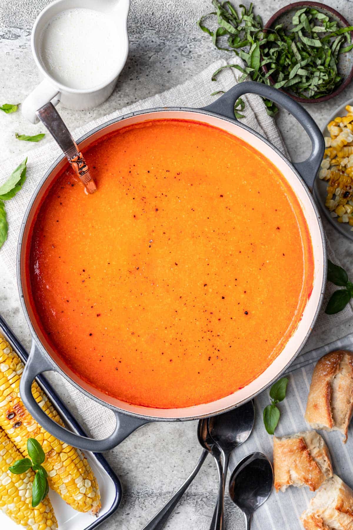 Roast tomato and corn soup in a large pot. 