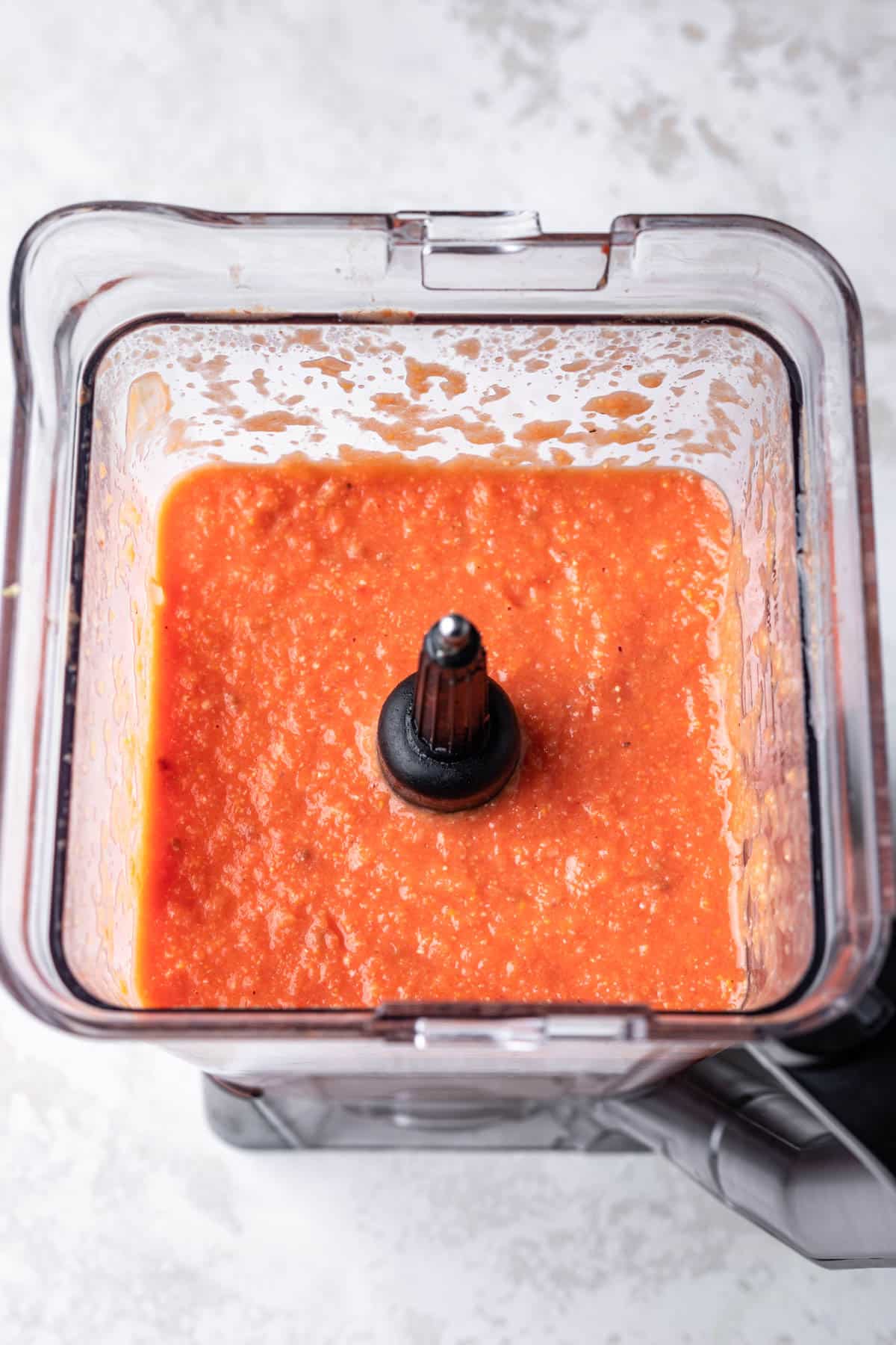 Blended tomato soup in a blender. 