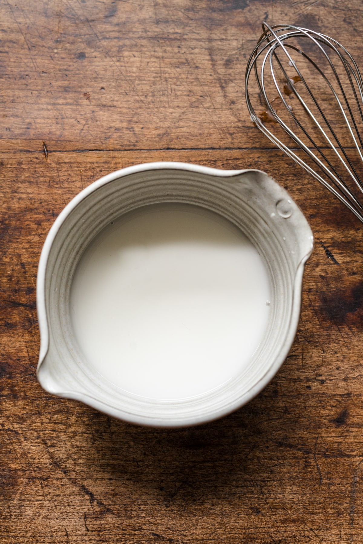 Cornstarch slurry in a white dish. 