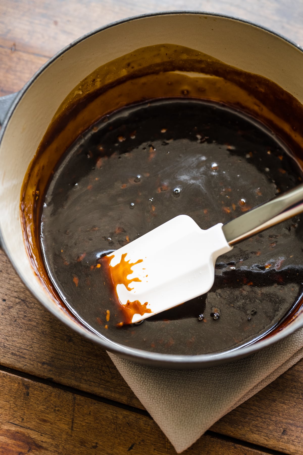Teriyaki sauce with a spatula in it.