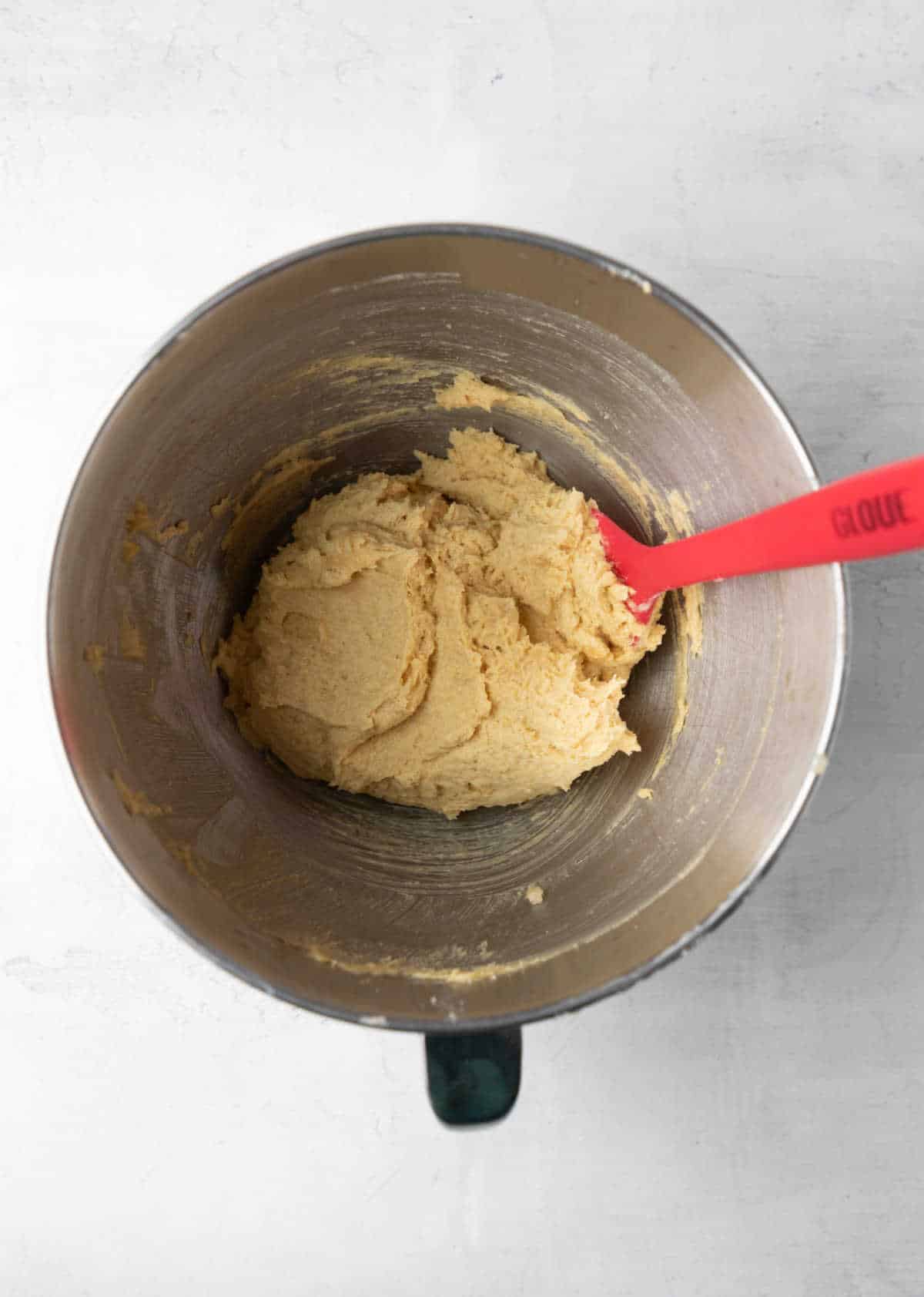 Eggs beaten into creamed butter and sugar mixture. 