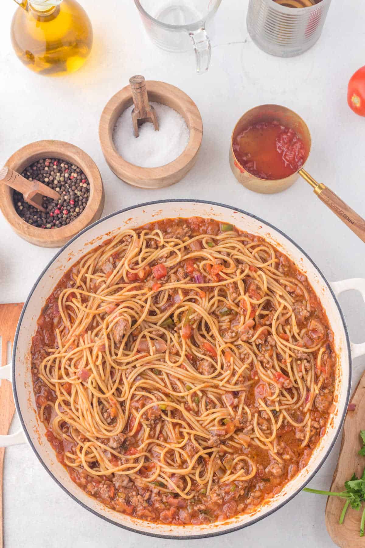 Cooked taco spaghetti in a skillet.