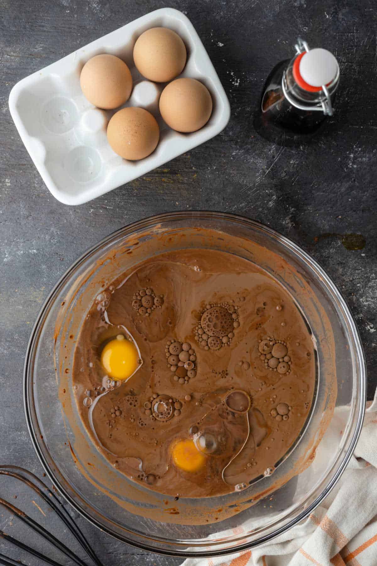 Eggs in chocolate batter.
