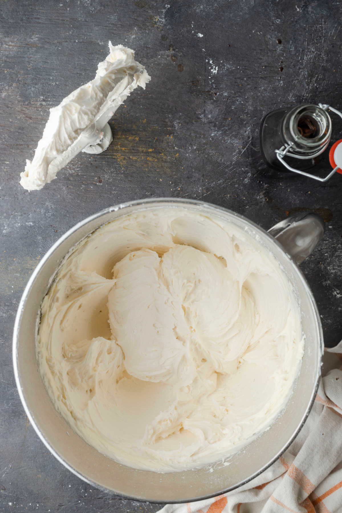 Vanilla buttercream in a silver mixing bowl. 