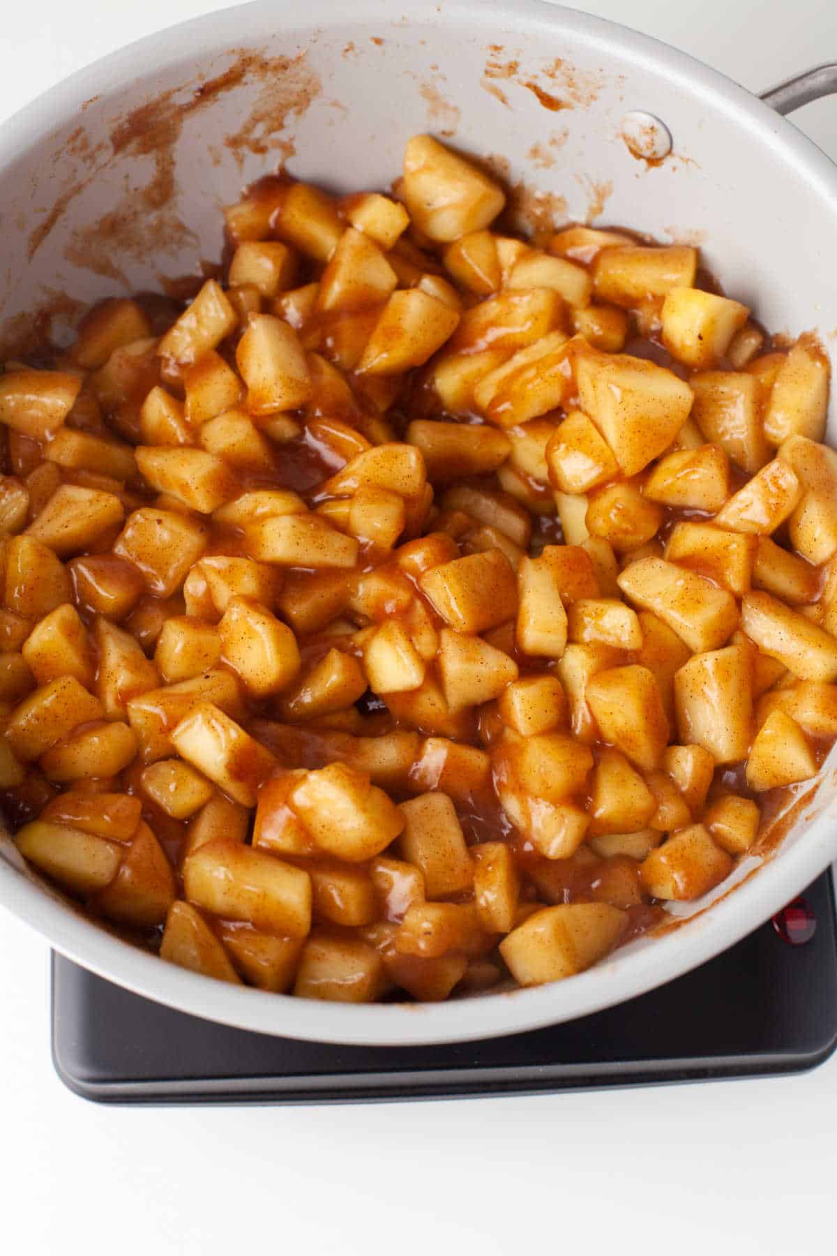 Apple pie filling in a skillet. 