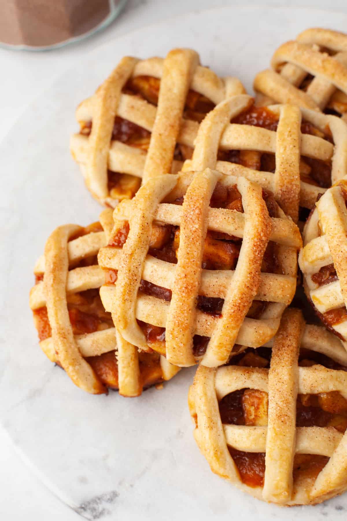 Close up photo of a stack of apple pie cookies. 