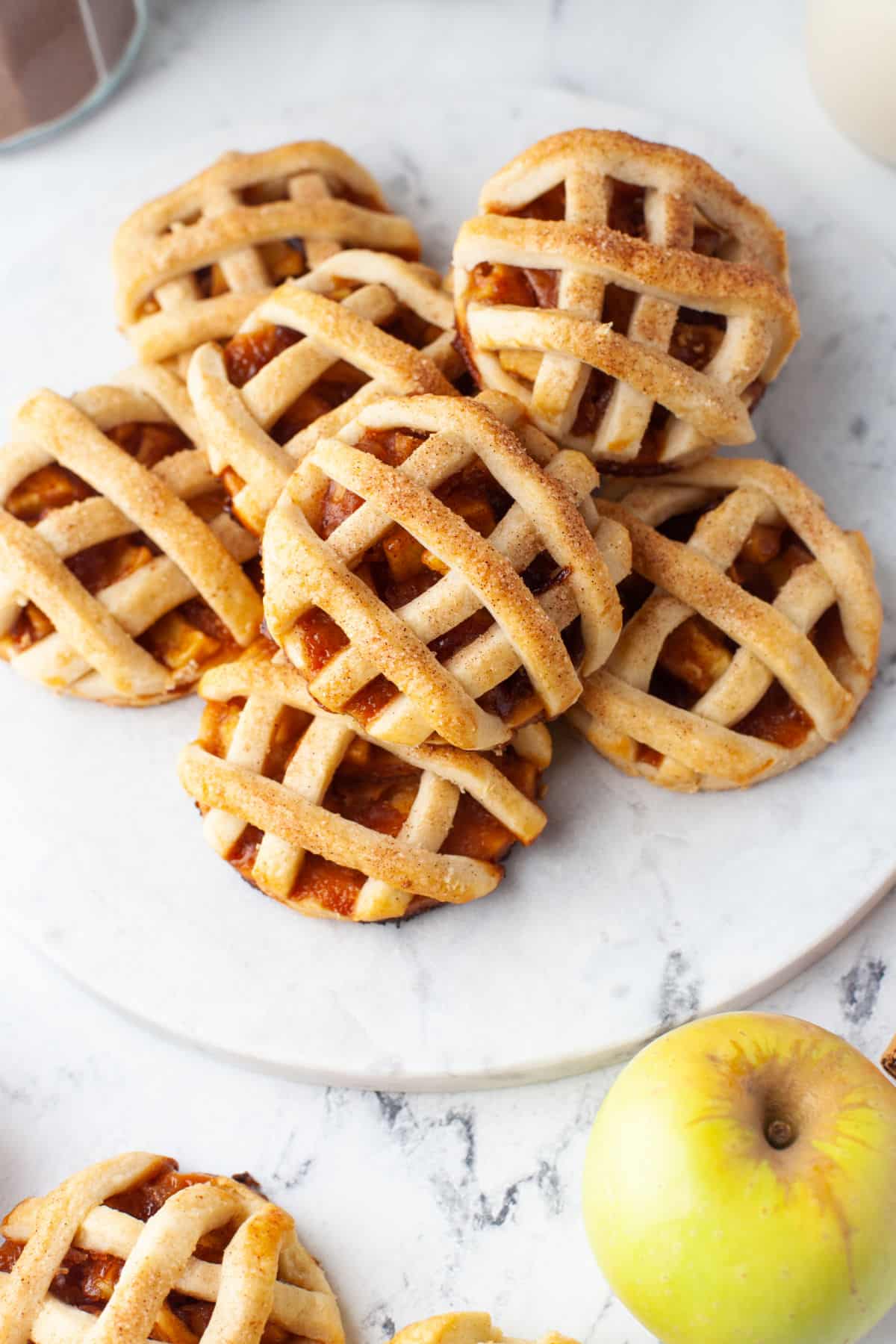 Apple pie cookies on a marble plate. 