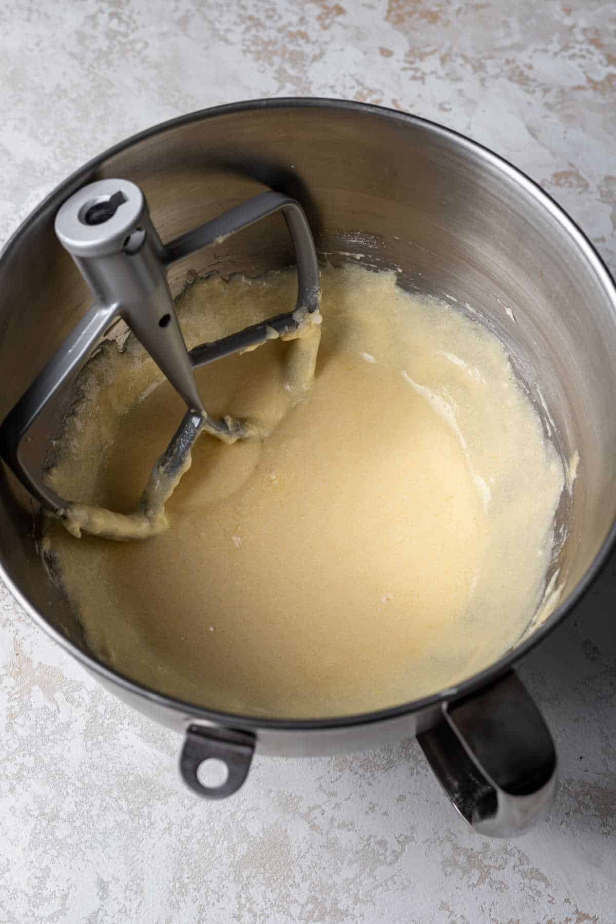 Wet ingredients mixed in a mixing bowl. 