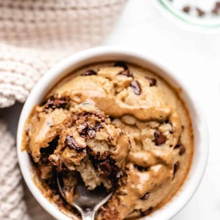 A spoon holding a bite of blended baked oats.