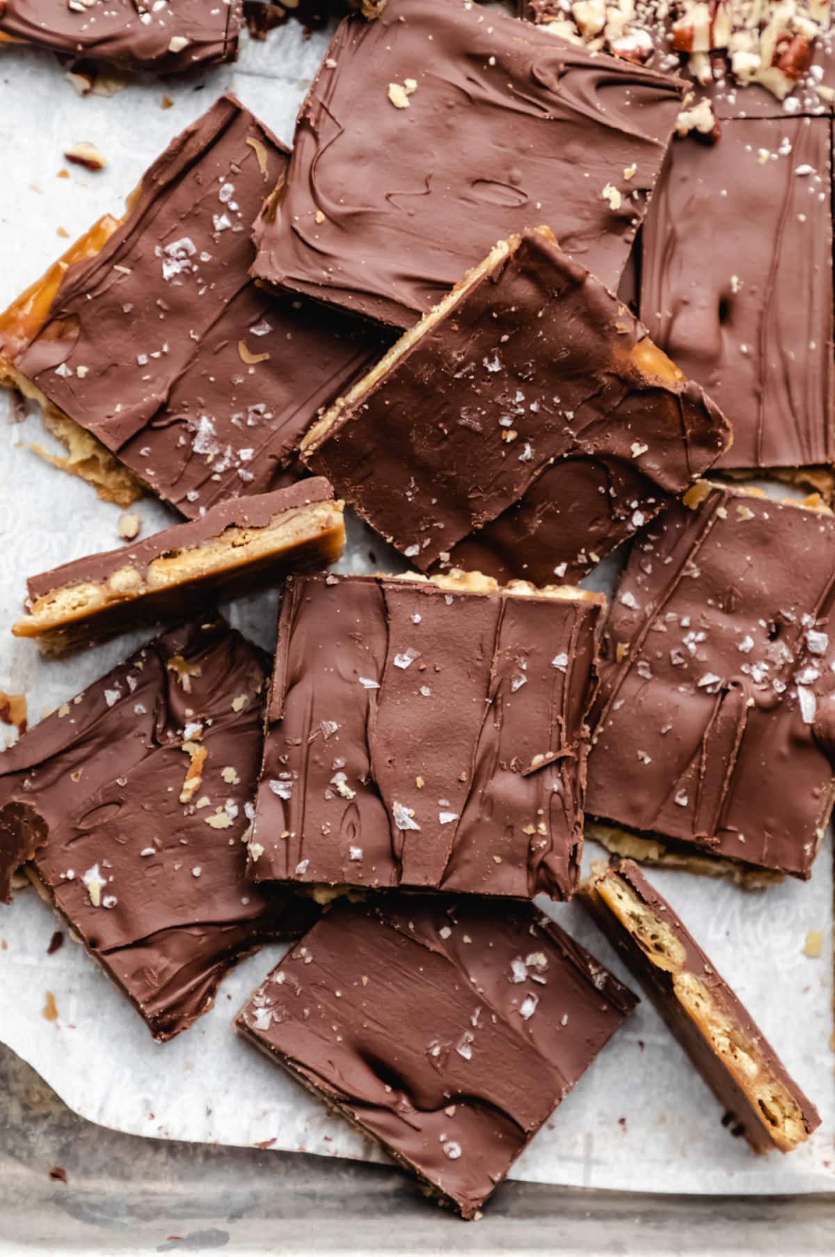 A stack of saltine toffee topped with sea salt. 