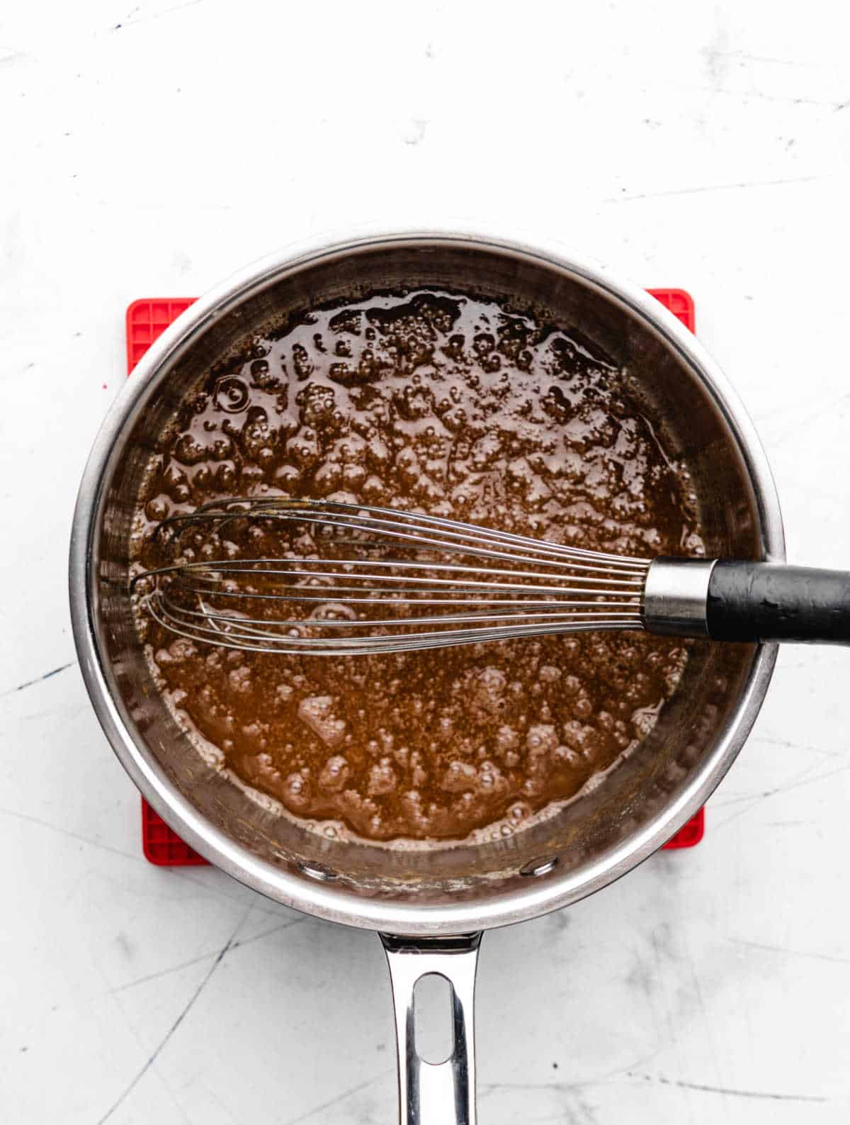 Vanilla mixed into boiling brown sugar butter mixture. 