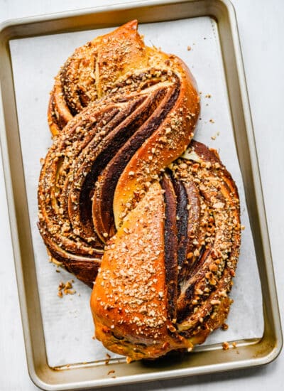 Nutella bread on a parchment paper-lined baking sheet.