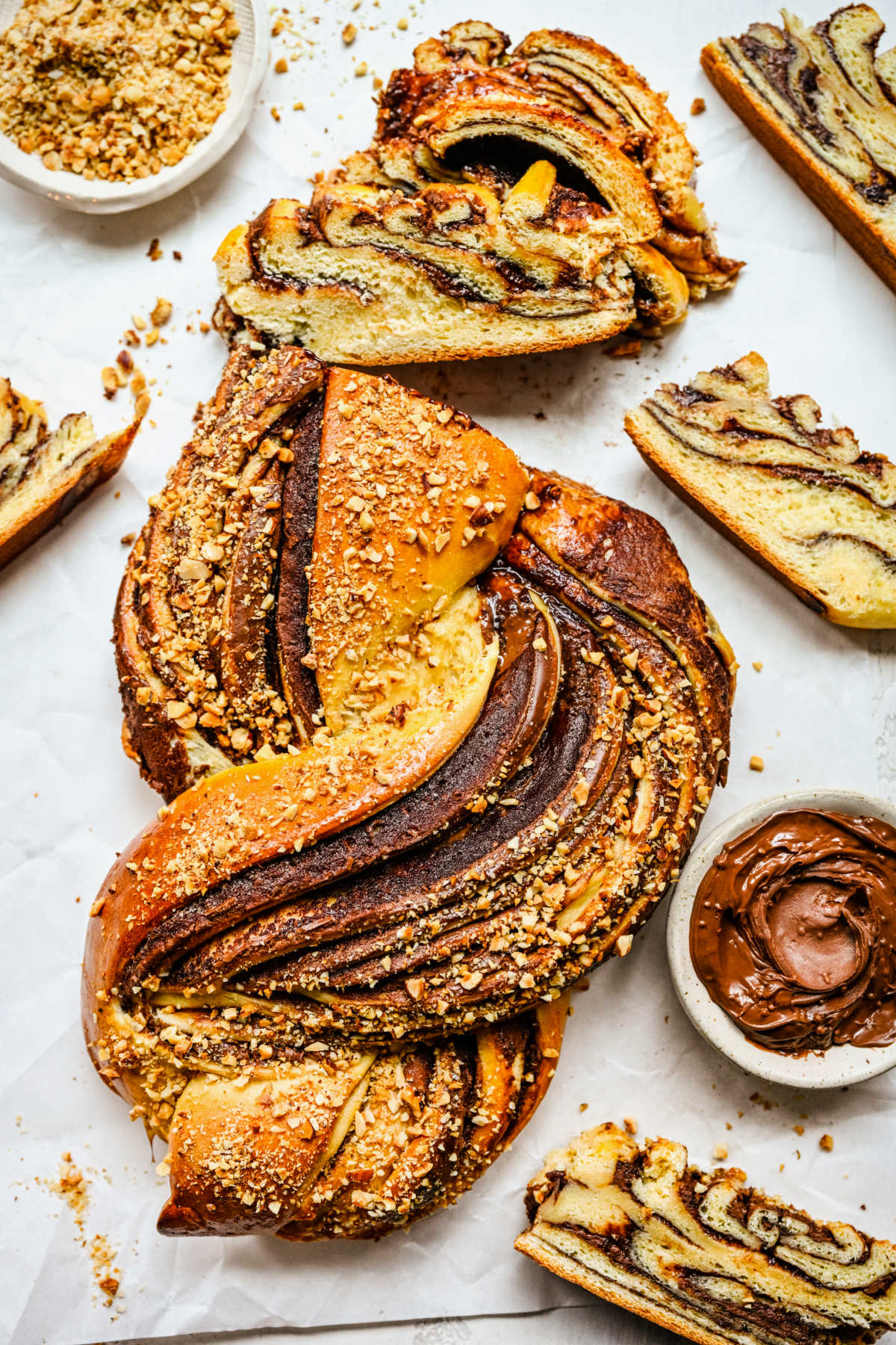 A loaf of Nutella bread with a couple slices cut.