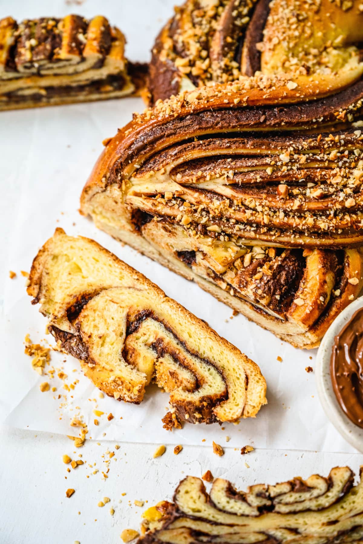 Slice of Nutella bread next to the loaf. 