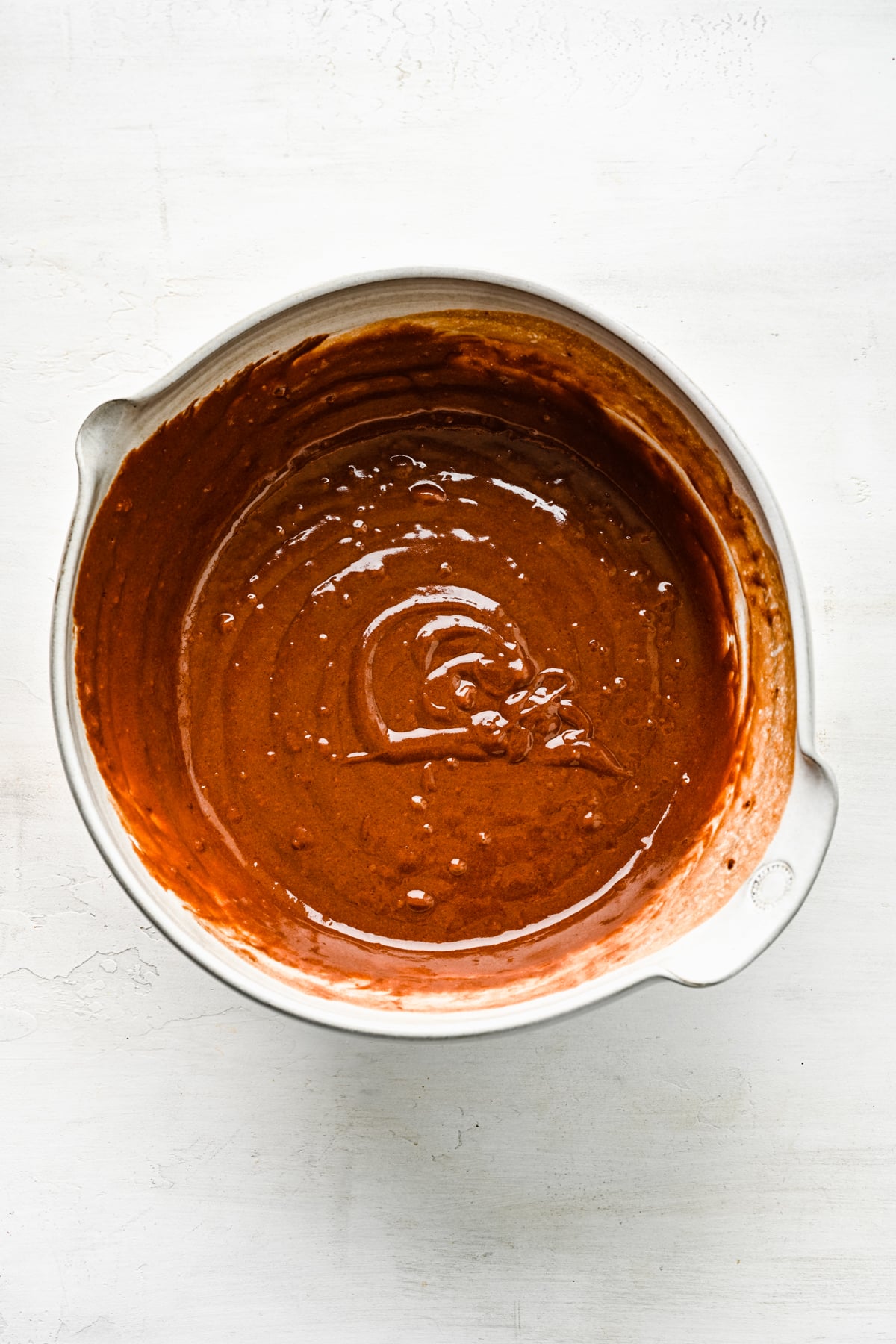 Wacky cake batter in a mixing bowl. 