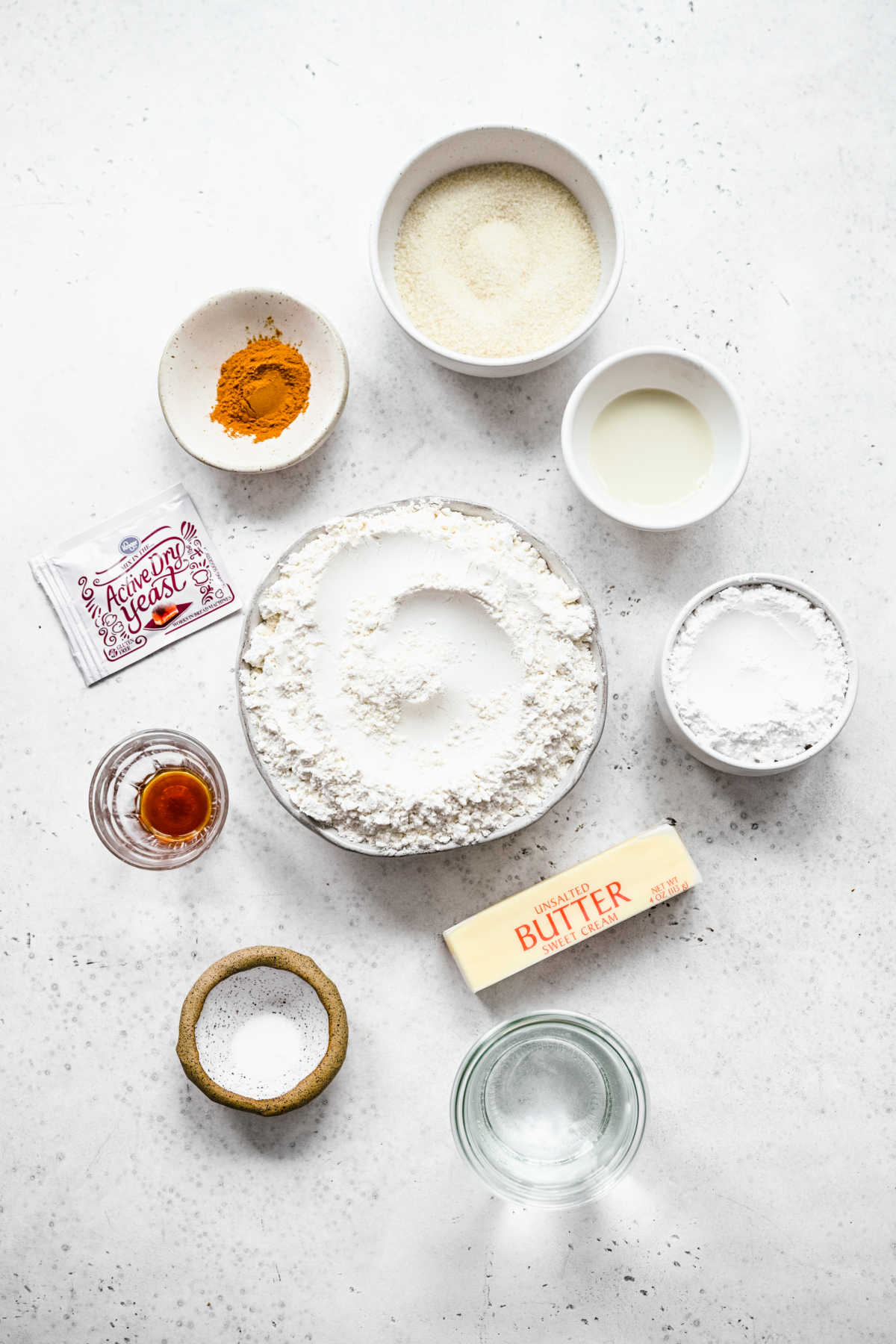 Ingredients for cinnamon roll bites in dishes. 