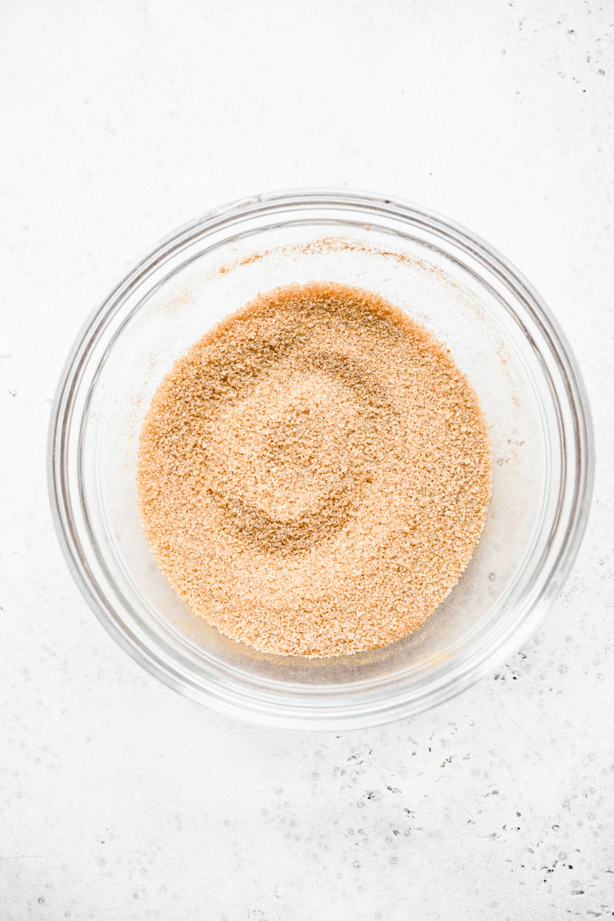 Cinnamon sugar in a glass dish. 