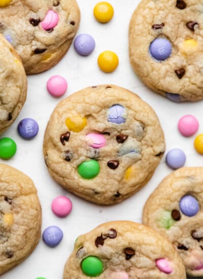 Easter M&M cookie surrounded by Easter M&Ms.