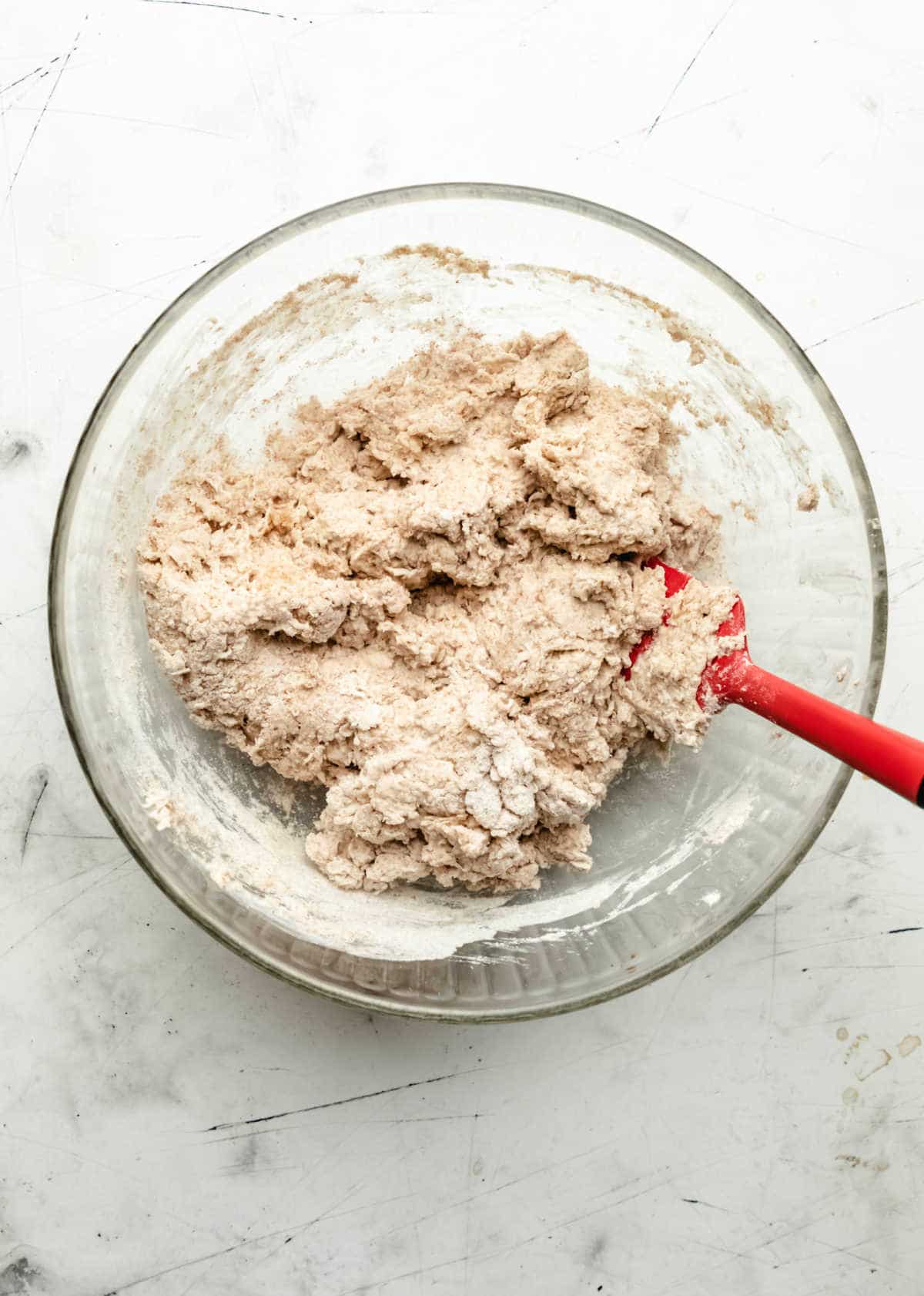 Irish brown soda bread dough in a mixing bowl. 