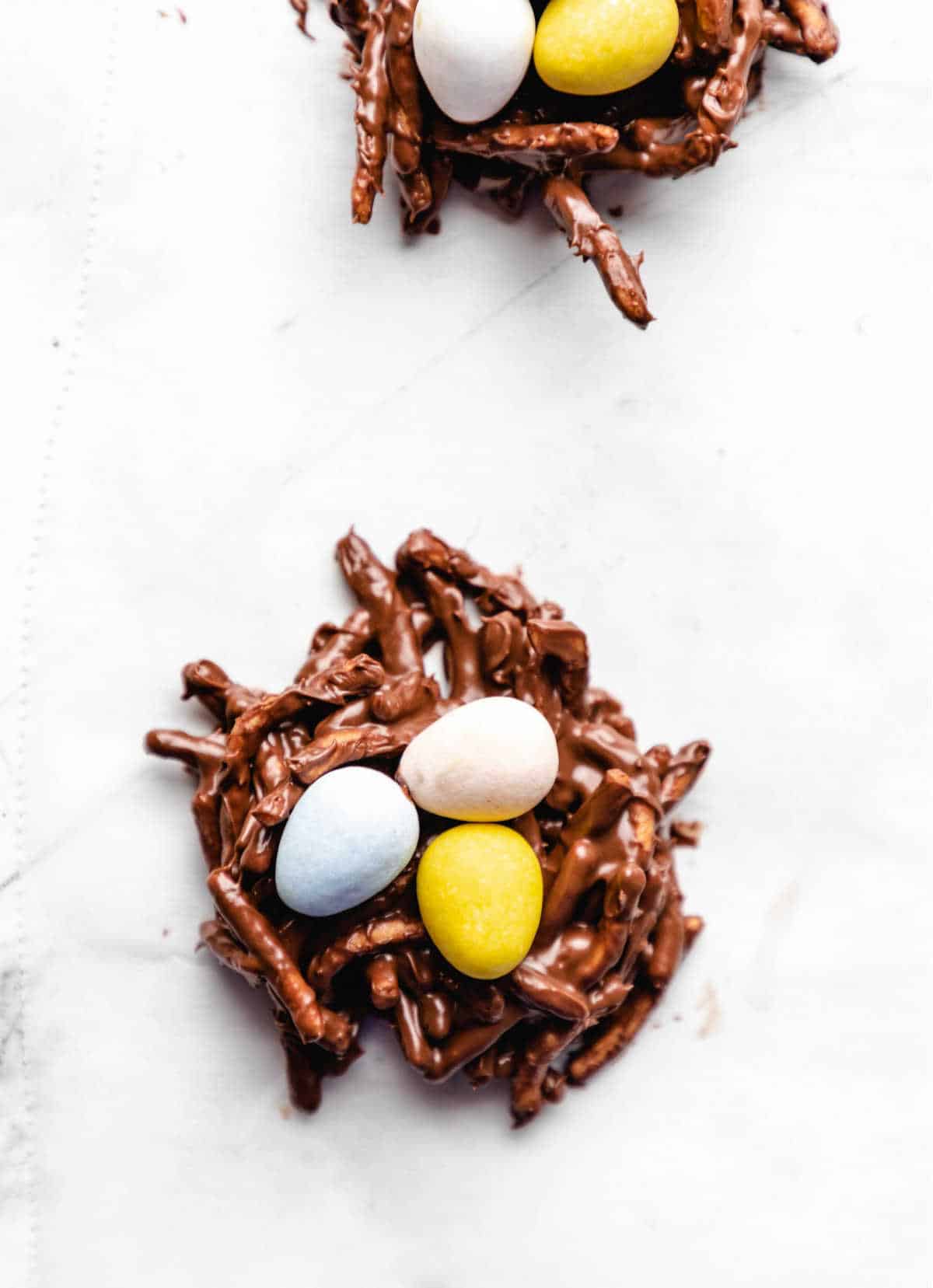 Candy eggs in the center of bird's nest cookies. 