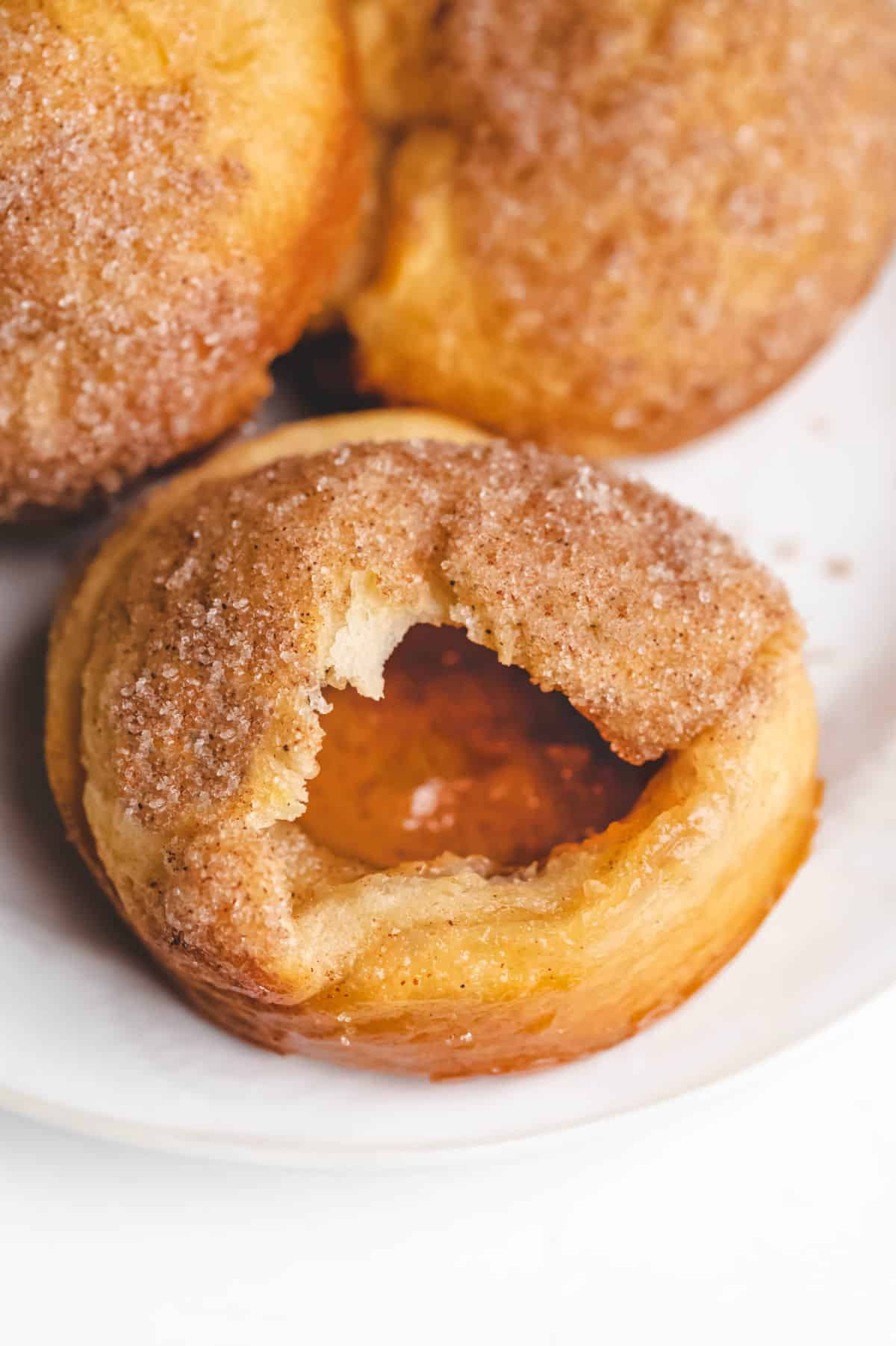 Three empty tomb rolls (resurrection rolls) on a white plate. 