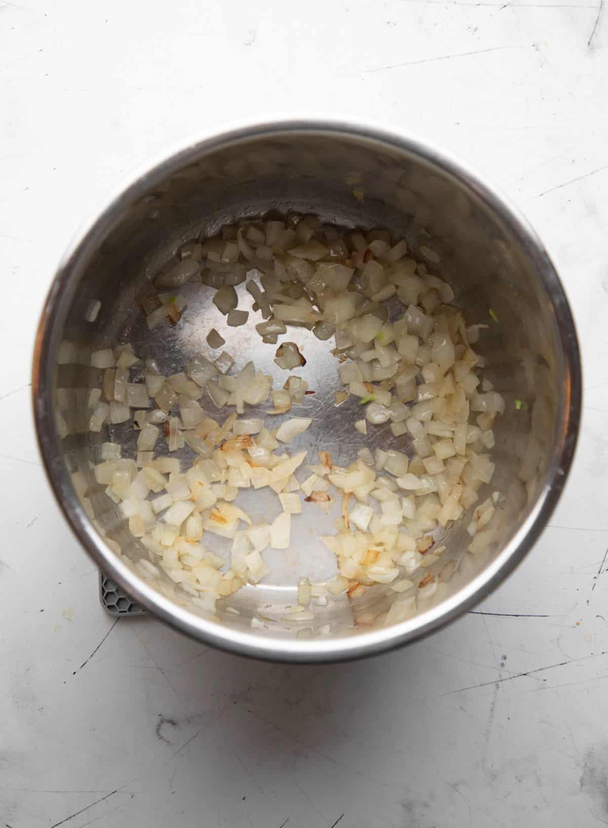 Sautéing onion in an instant pot.
