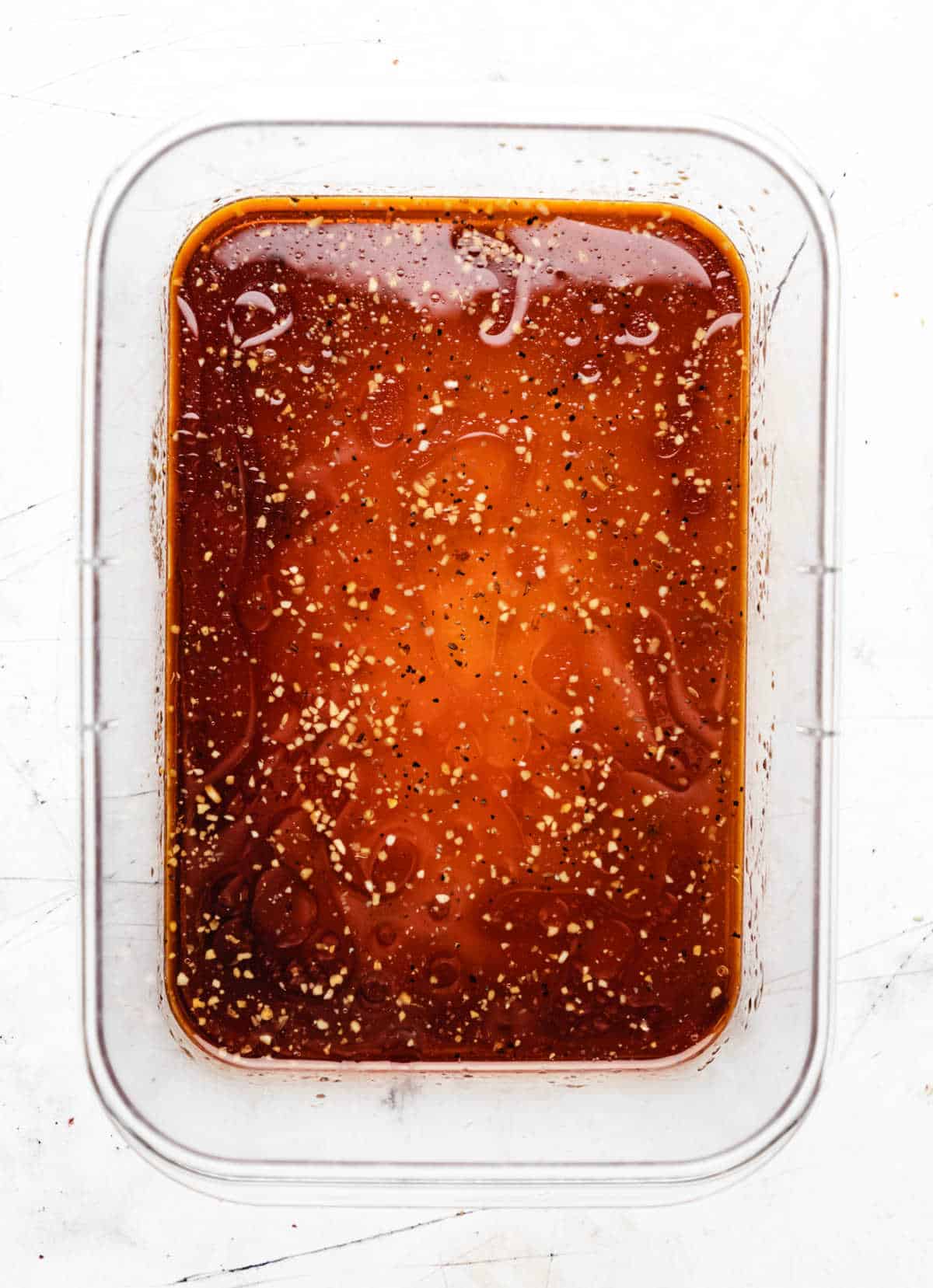 Steak marinade in a resealable container. 