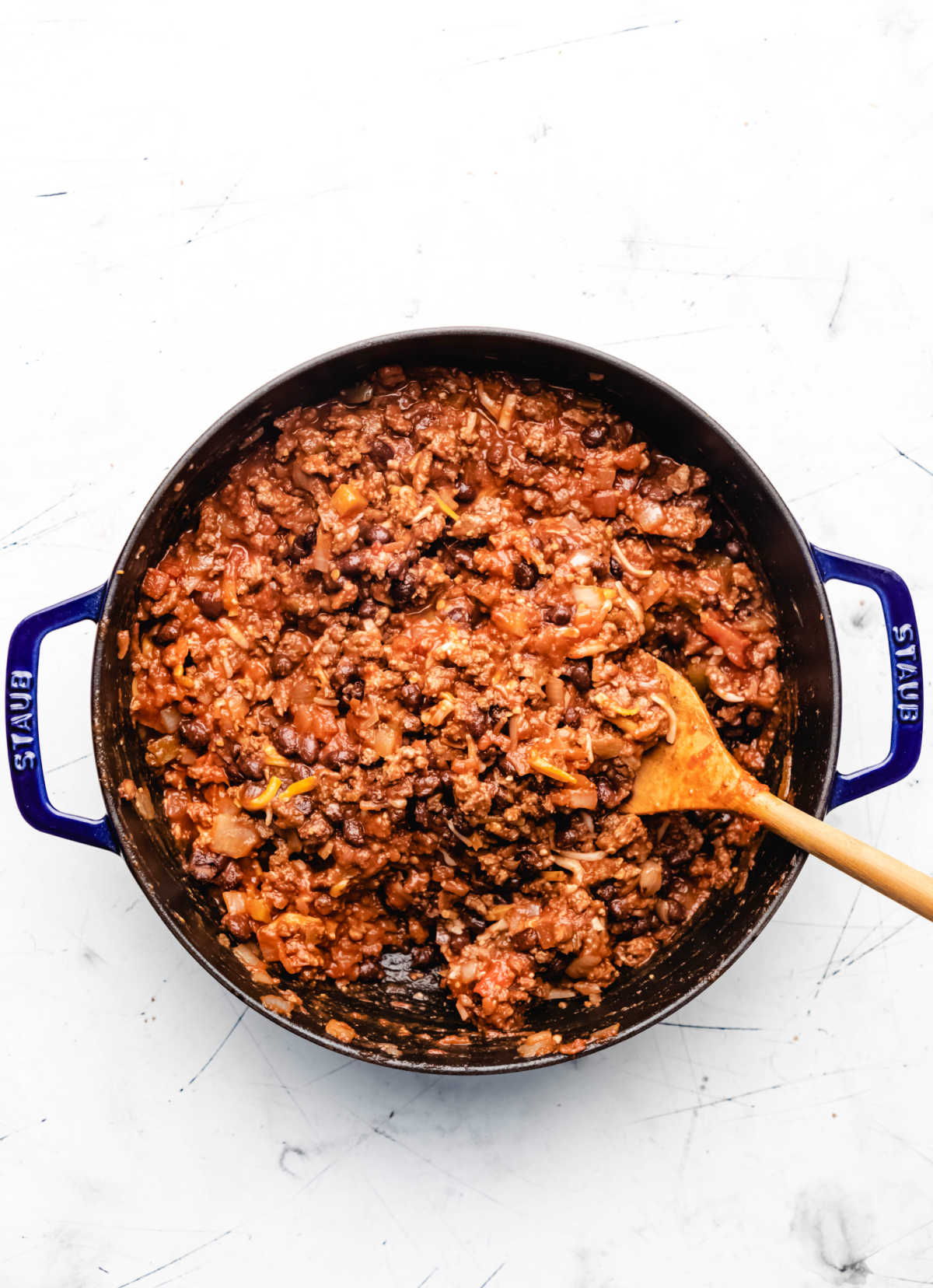 Tomato salsa ground beef mixture in a skillet. 