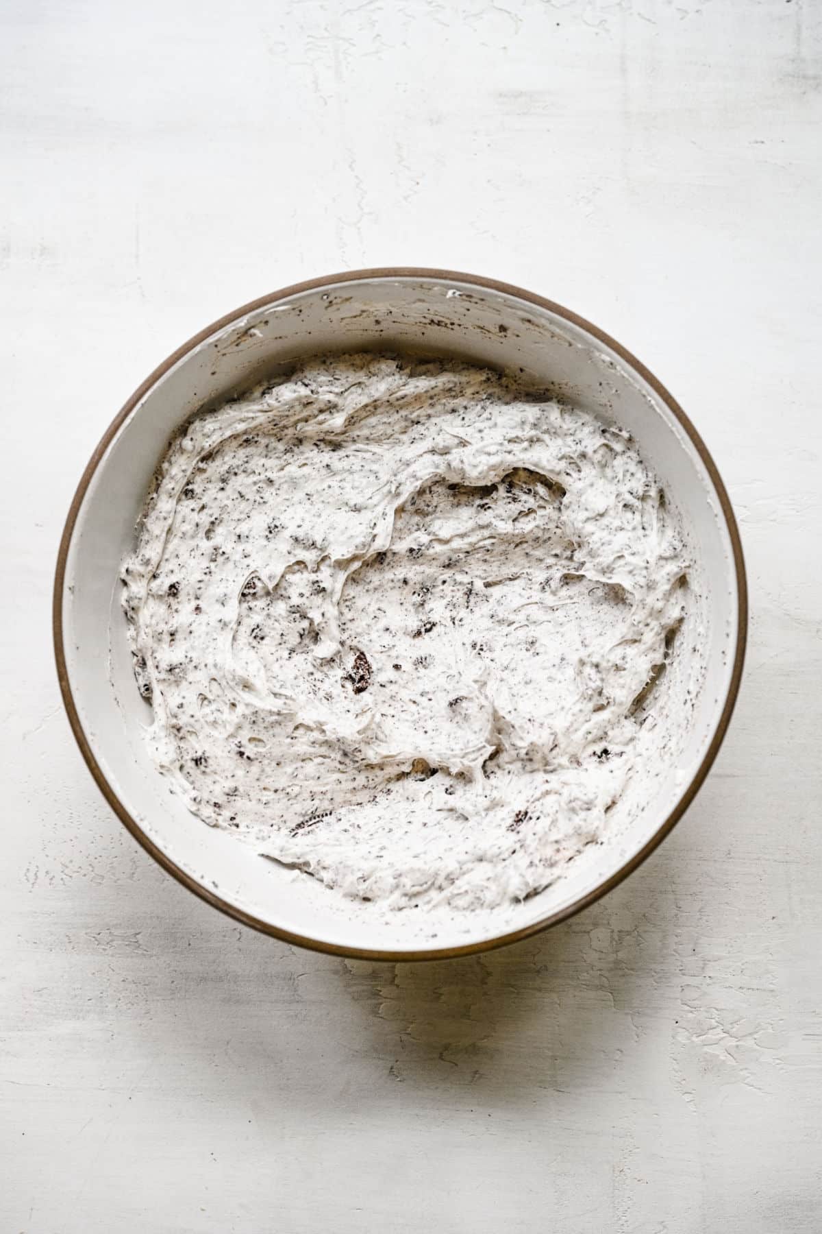 A mixing bowl filled with Oreo fluff.