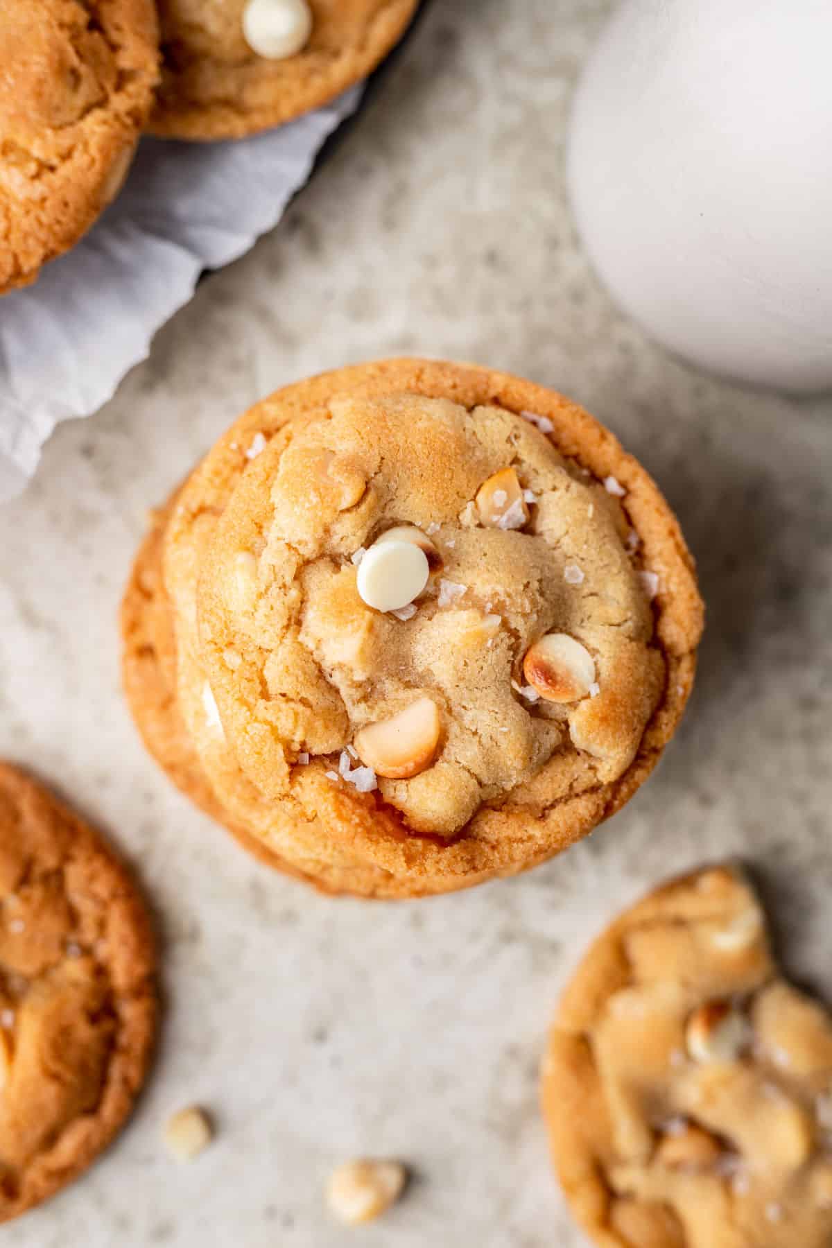 A stack of white chocolate macadamia nut cookies. 