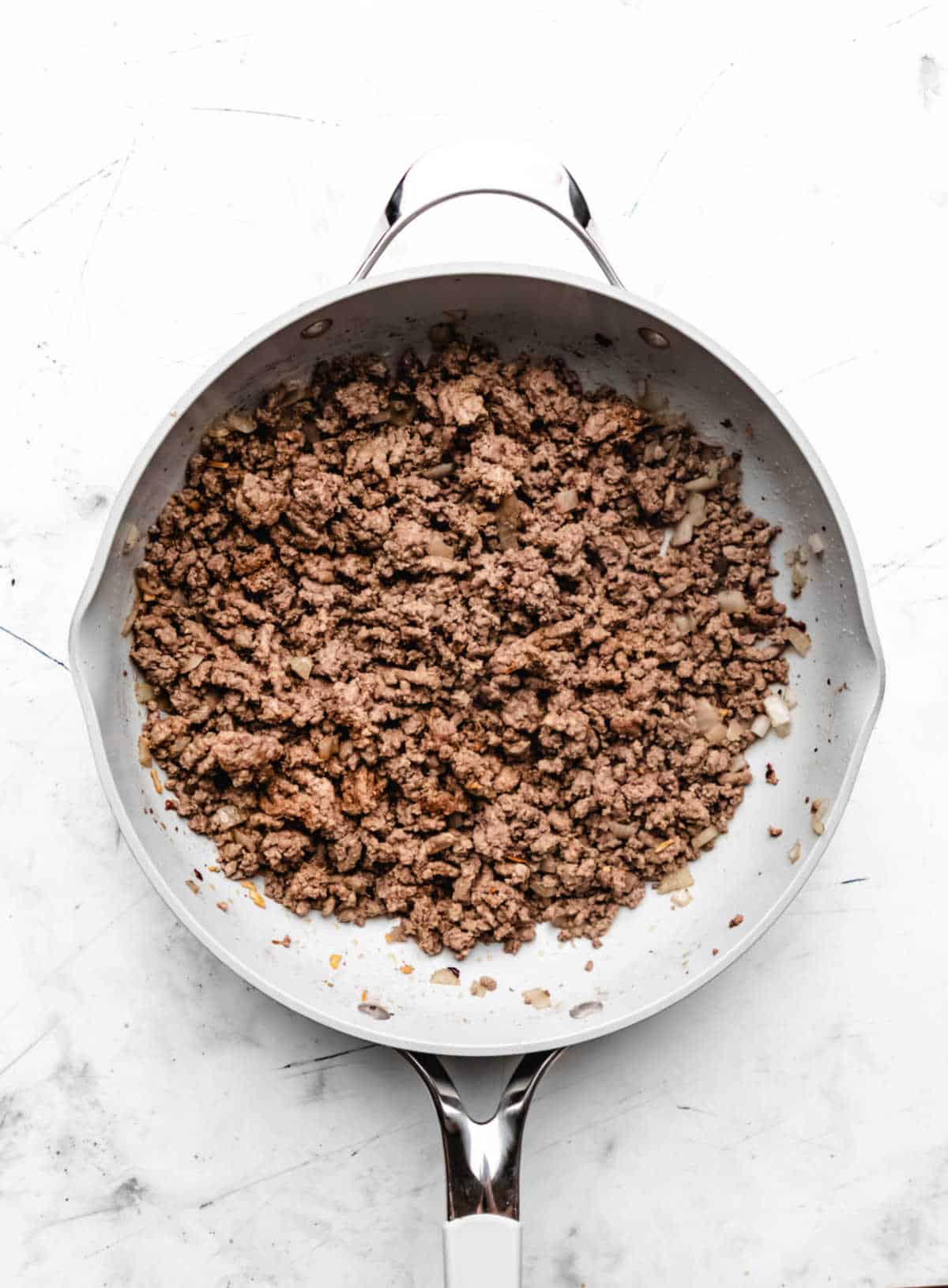 Browned ground beef in a large skillet. 