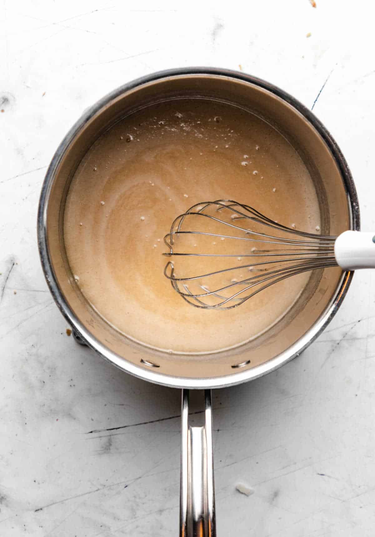Melted butter and sugars in a saucepan. 