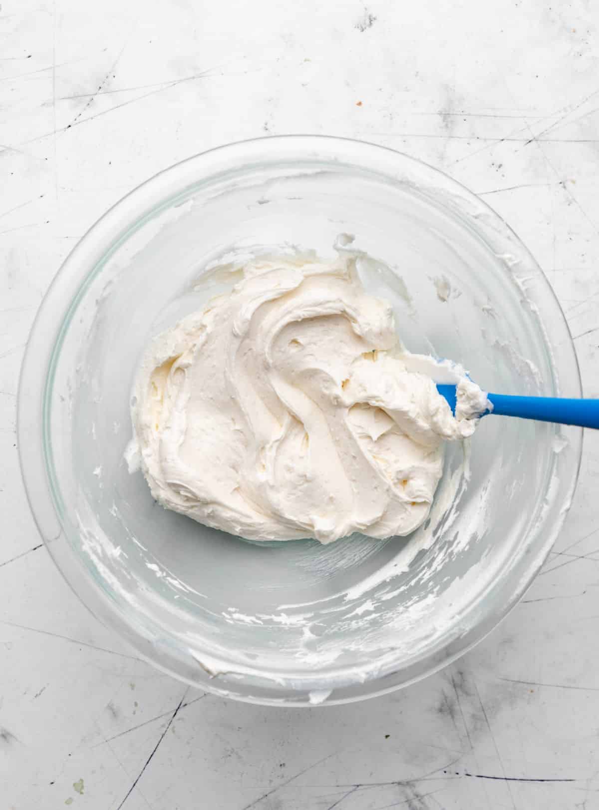 Heavy cream beaten into powdered sugar and butter mixture. 