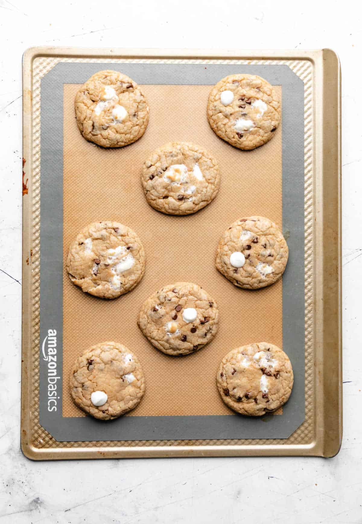 Baked s'mores cookies on a baking sheet. 